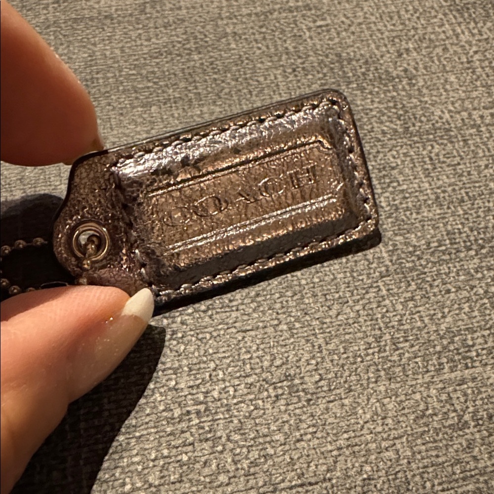 Coach SILVER METALLIC LEATHER hang tag